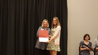 Mandy Benter (Public History alumna, M.A.) receives Excellence Award from Dean Grasso